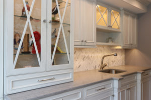 A picture of a beautiful finished kitchen with nice cabinets