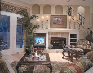 A comfortable living room featuring masonry accents.